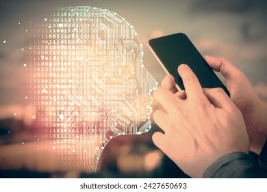 Double exposure of man's hand holding and using a digital device and brain hologram drawing. Data concept.