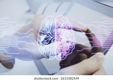 Double exposure of man's hand holding and using a digital device and brain hologram drawing. Data concept.
