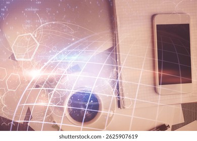Double exposure of map hologram drawing over desktop. Top view. International connection concept.