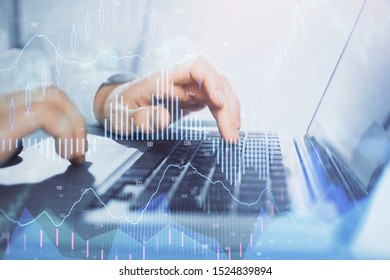 Double exposure of market chart with man working on computer on background. Concept of financial analysis. - Shutterstock ID 1524839894