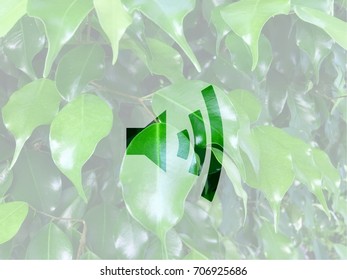 Double Exposure Of Maximum Sound Sign And Green Leaves Background.
