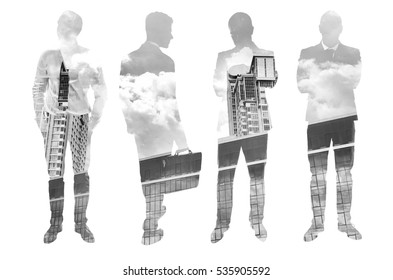 Double Exposure Of Men Silhouettes And Cityscape Background. Business Concept. Black And White Photo.