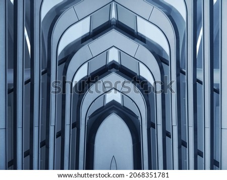 Double exposure of modern architecture resembling church entrance. Abstract steel and glass sturcture of hi-tech building interior. Business real estate. Material geometric background with curvy archs