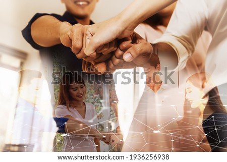 Double Exposure network asian businesspeople partnership in the office of fist coordination bump : Cooperation concept Successful business concept