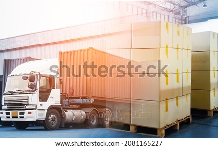 Double Exposure of Package Boxes with Semi Trailer Truck Loading Cargo at Distribution Warehouse. Commerce Supply Chain. Shipment. Shipping Freight Truck. Logistics Cargo Transport Concept.	