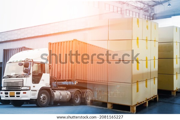 Double Exposure of Package Boxes with Semi\
Trailer Truck Loading Cargo at Distribution Warehouse. Commerce\
Supply Chain. Shipment. Shipping Freight Truck. Logistics Cargo\
Transport Concept.	