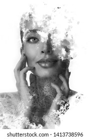 Double Exposure. Paintography. Portrait Of A Beautiful Young Female Model Disappearing Behind Black Ink Painting On White Background