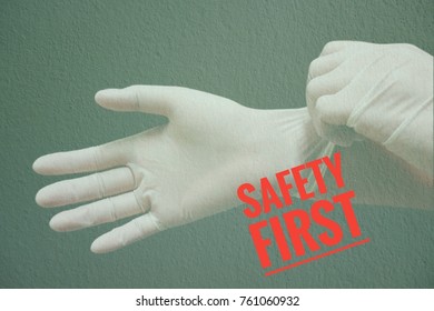 Double Exposure Pattern Of Female Hands Wearing Disposable Latex Gloves Gesture And Green Abstract Background With Safety First Banner.