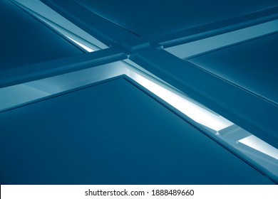 Double exposure photo of girders under ceiling. Abstract modern architecture and mimalist interior photo with intersection of beams. Minimal geometric structure. Diagonal composition of parallel lines