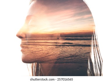 Double Exposure Portrait Of A Woman Combined With Photograph Of Nature