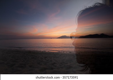 Double exposure portrait of a woman combined with photograph of a sea in sunset
