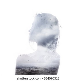 Double Exposure Portrait Of Young Thoughtful Woman Combined With Photograph Of Ocean With Mountains And Flying Birds. Conceptual Image Showing Unity Of Human With Nature. Ecology, Freedom, Environment