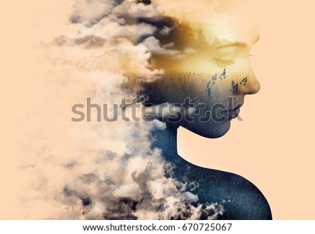 Double exposure portrait of young woman and morning mist in the forest.
