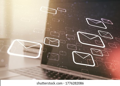 Double Exposure Of Postal Envelopes Hologram On Laptop Background. Electronic Mail And Spam Concept