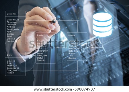 Double exposure of professional businessman system analysis design and drawing database table with futuristic background
