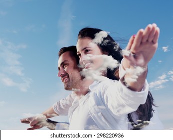 double exposure of romantic young couple and sky clouds - Powered by Shutterstock