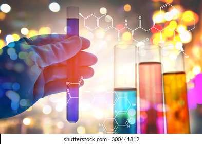Double exposure of scientist hand holding laboratory test tube