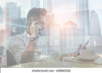 Double Exposure Of Serious Businessman Making A Phone Call