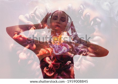 Double exposure silhouette. Music energy. Trance chill relaxation. Portrait shape of hypnotized woman enjoying listening to sound in headphones in colorful ink fluid smoke cloud explosion.
