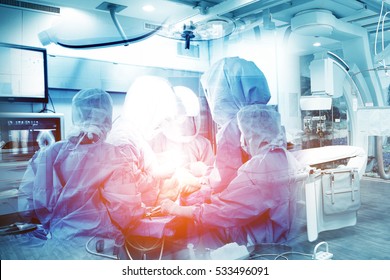 Double exposure of Skillful doctors are operating on a patient. Team of surgeon in uniform perform operation on a patient, healthcare and science concept - Shutterstock ID 533496091