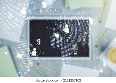 Double exposure of social network icons concept with world map and digital tablet on background, top view. Marketing and promotion concept
