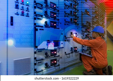 Double Exposure Soft Focus Of  Engineer Checking And Monitoring The Electrical System In Electrical Switch Gear At Low Voltage Motor Control Center Cabinet Room,Technology Industry Concept