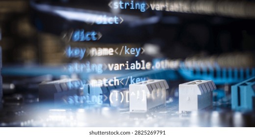 Double exposure of software code syntax and electronic components on a computer circuit board.