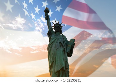 Double exposure with statue of liberty and United States flag blowing in the wind. - Powered by Shutterstock