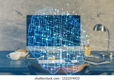 Double exposure of table with computer and brain hologram. Data innovation concept.