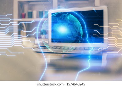 Double exposure of table with computer and brain hologram. Data innovation concept.