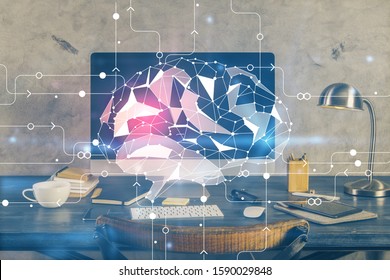 Double exposure of table with computer and brain hologram. Data innovation concept.