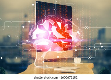 Double exposure of table with computer and brain hologram. Data innovation concept.