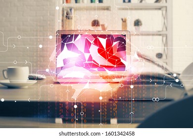 Double exposure of table with computer and brain hologram. Data innovation concept.