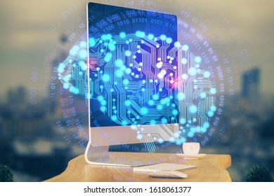 Double exposure of table with computer and brain hologram. Data innovation concept.