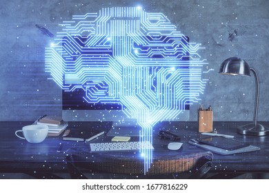 Double exposure of table with computer and brain hologram. Data innovation concept.