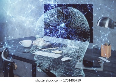 Double exposure of table with computer and brain hologram. Data innovation concept.