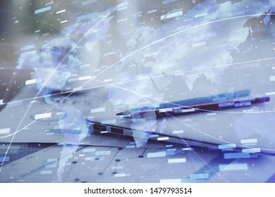 Double exposure of table with computer on background and data theme hologram. Data technology concept.