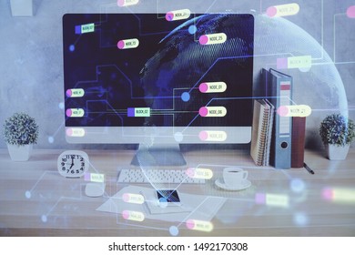 Double exposure of table with computer on background and data theme hologram. Data technology concept.