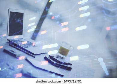 Double exposure of table with computer on background and data theme drawing. Concept of innovation.