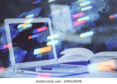 Double exposure of table with computer on background and data theme hologram. Data technology concept.