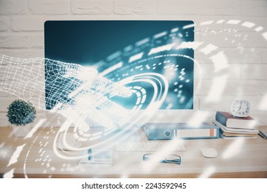 Double exposure of table with computer on background and data theme hologram. Data technology concept.