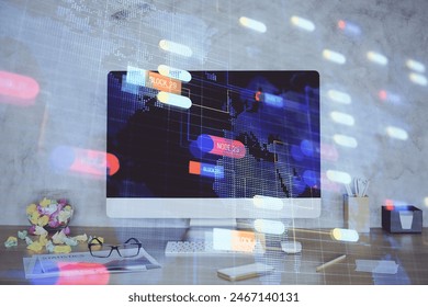 Double exposure of table with computer on background and data theme hologram. Data technology concept.