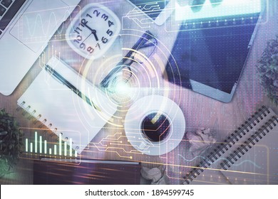 Double exposure of technology theme drawing over work table desktop. Top view. Global data analysis concept.