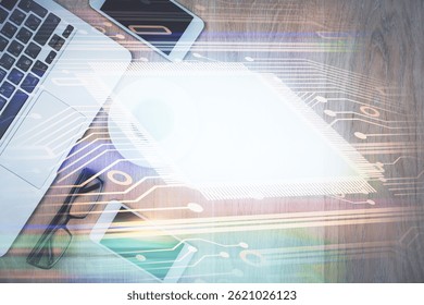 Double exposure of technology theme drawing over work table desktop. Top view. Global data analysis concept.