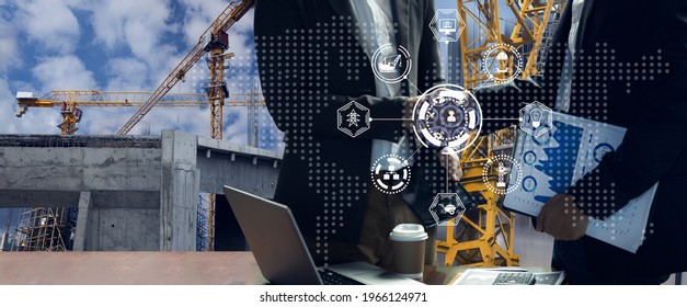 Double exposure two engineering using with digital technology interfaces icon and construction cranes background, Business industrial and technology concept. - Powered by Shutterstock - Get 15% off with code: PIKWIZARD15