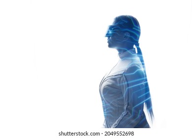 Double exposure of woman and futuristic holographic interface to display data. Female in futuristic costume using VR helmet. Augmented reality, future technology, game concept. White background.
