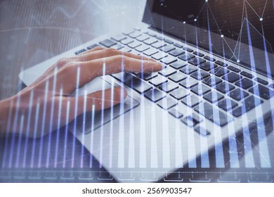 Double exposure of woman hands typing on computer and forex chart hologram drawing. Stock market analysis concept.