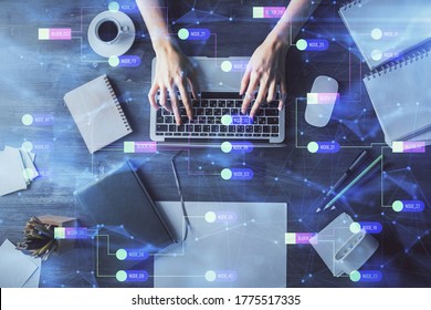 Double Exposure Of Woman Hands Working On Computer And Data Theme Hologram Drawing. Top View. Technology Concept.