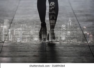 Double Exposure Of Woman Walking With Hong Kong City. Black And White Image.