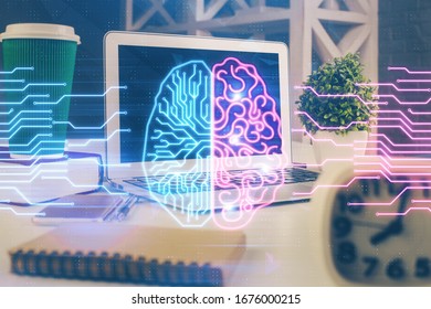 Double exposure of work space with computer and human brain drawing hologram. Brainstorm concept.